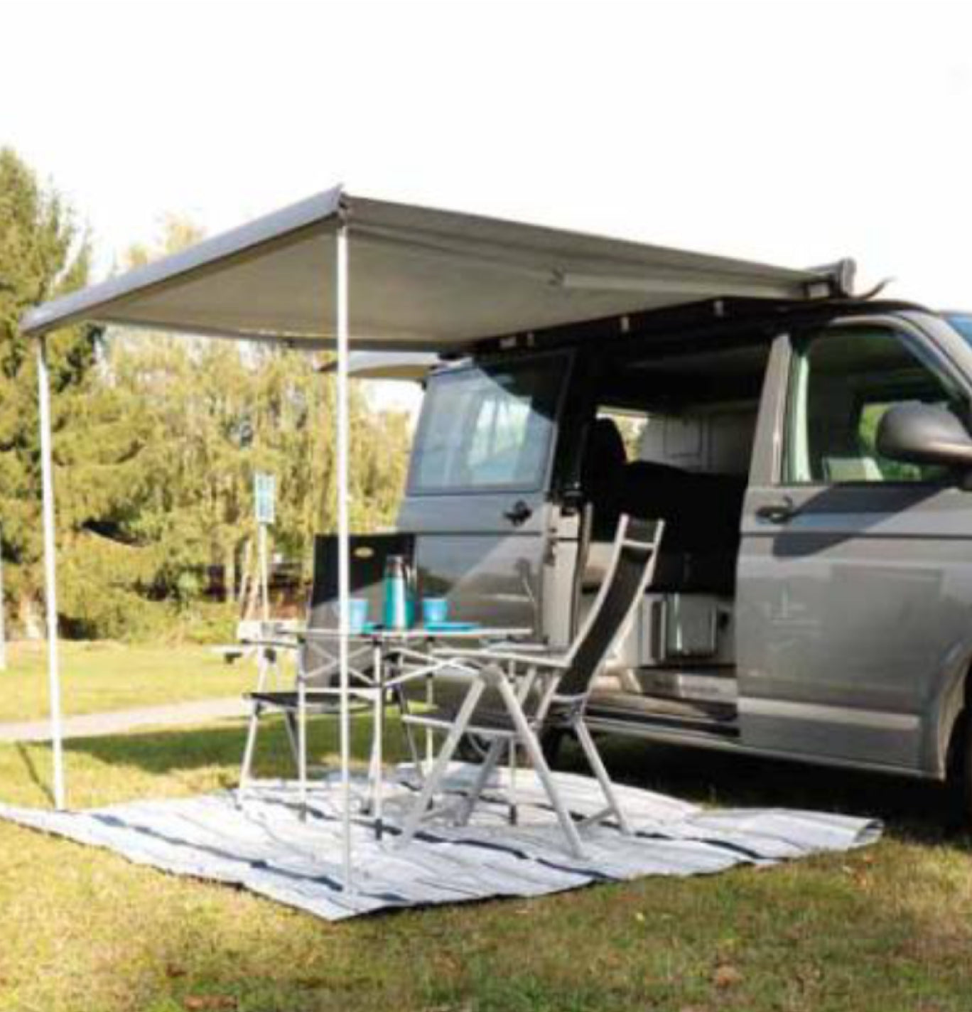 Thule Omnistor Attached to a VW & camping furniture pitched
