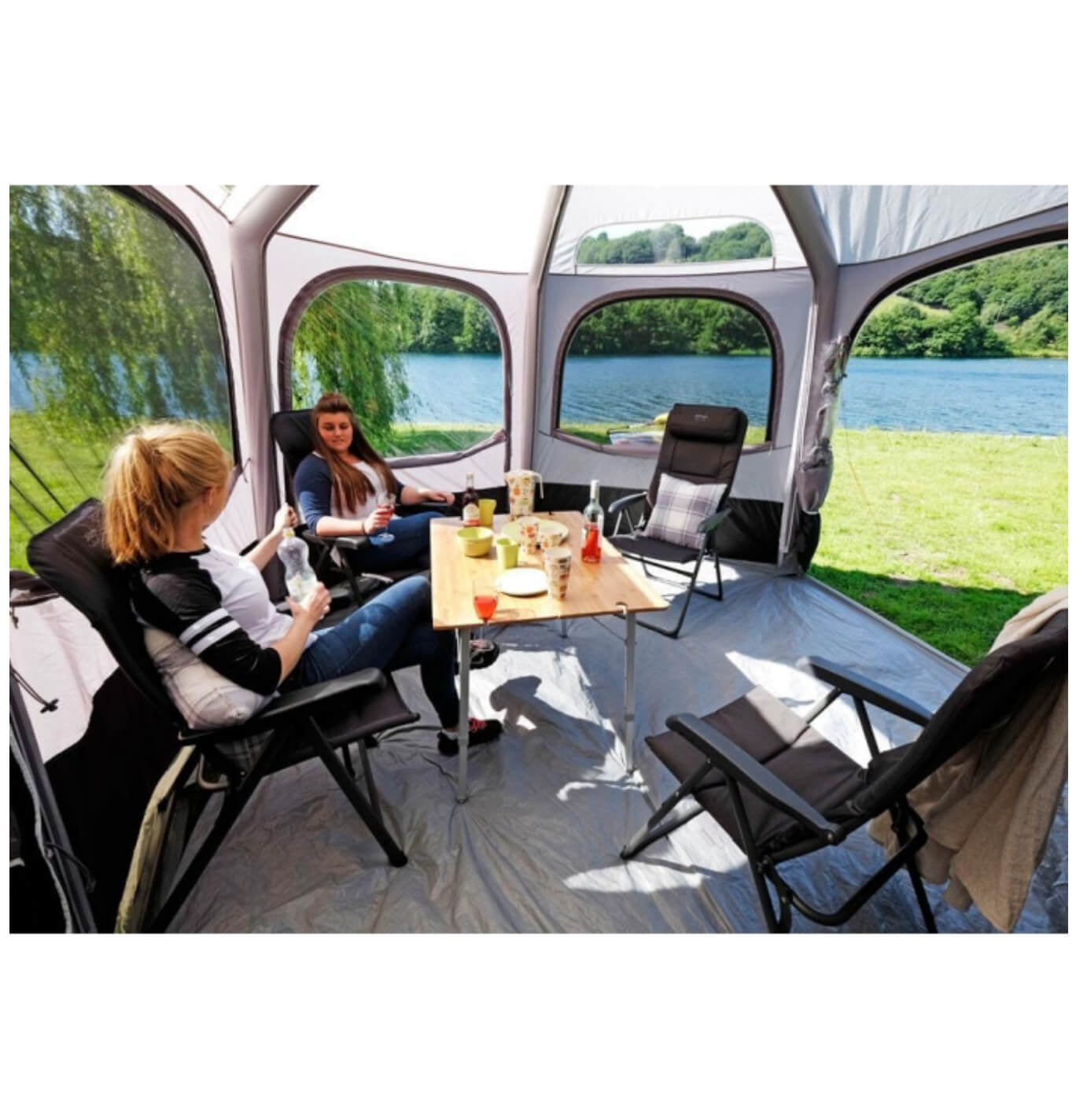 Hexaway living space with people enjoying picnic